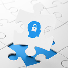 Image showing Finance concept: Head With Padlock on puzzle background