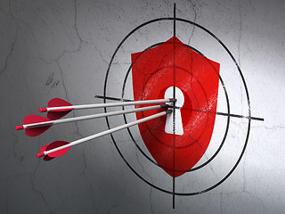 Image showing Protection concept: arrows in Shield With Keyhole target on wall