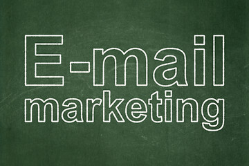 Image showing Advertising concept: E-mail Marketing on chalkboard background