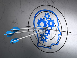 Image showing Information concept: arrows in Head With Gears target on wall