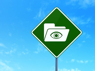 Image showing Business concept: Folder With Eye on road sign background