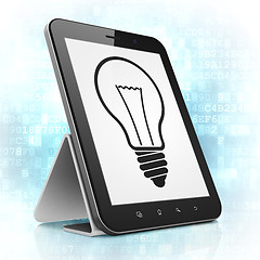 Image showing Finance concept: Light Bulb on tablet pc computer