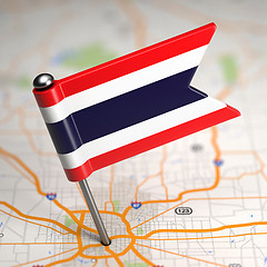 Image showing Thailand Small Flag on a Map Background.