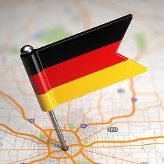 Image showing Germany Small Flag on a Map Background.