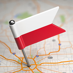 Image showing Poland Small Flag on a Map Background.