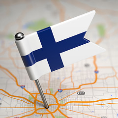 Image showing Finland Small Flag on a Map Background.