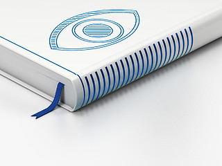 Image showing Protection concept: closed book, Eye on white background