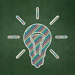Image showing Business concept: Light Bulb on chalkboard background