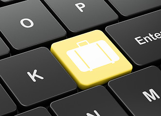 Image showing Travel concept: Bag on computer keyboard background