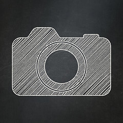 Image showing Tourism concept: Photo Camera on chalkboard background