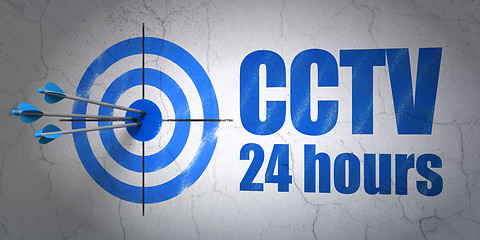 Image showing Security concept: target and CCTV 24 hours on wall background