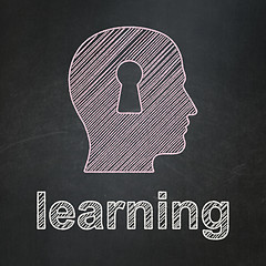 Image showing Education concept: Head With Keyhole and Learning on chalkboard background