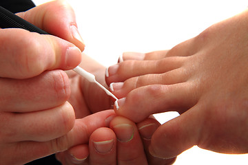 Image showing pedicure, making nails (feet) 