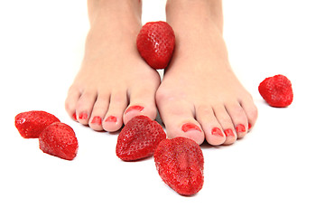 Image showing woman feet and strawberries