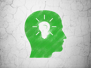 Image showing Marketing concept: Head With Light Bulb on wall background