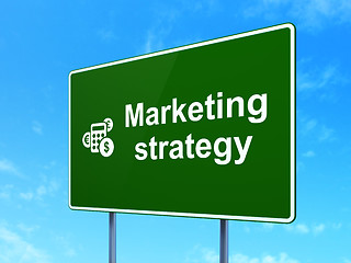 Image showing Advertising concept: Marketing Strategy and Calculator on sign