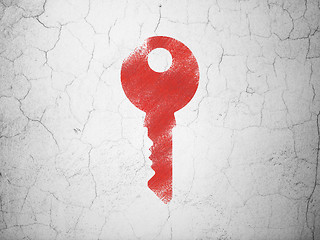 Image showing Protection concept: Key on wall background