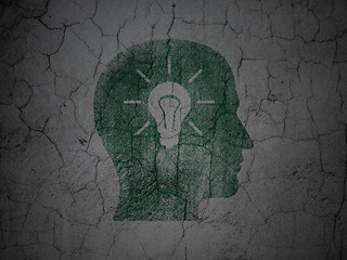 Image showing Data concept: Head With Light Bulb on grunge wall background