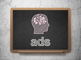 Image showing Marketing concept: Head With Finance Symbol and Ads