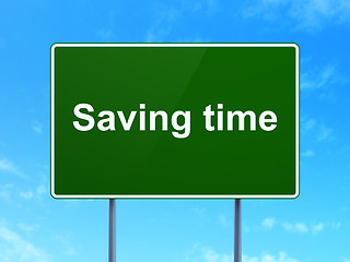 Image showing Saving Time on road sign background