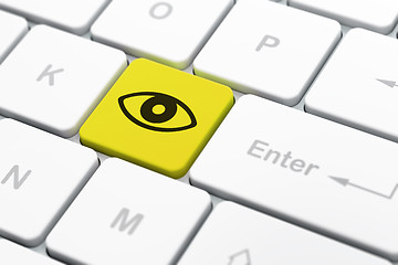 Image showing Safety concept: Eye on computer keyboard background