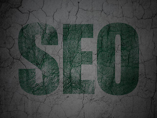 Image showing Web development concept: SEO on grunge wall background