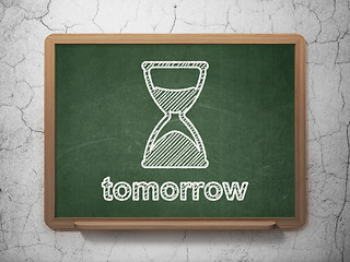 Image showing Time concept: Hourglass and Tomorrow on chalkboard background