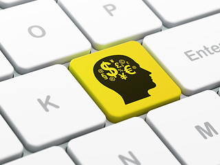 Image showing Marketing concept: Head With Finance Symbol on keyboard