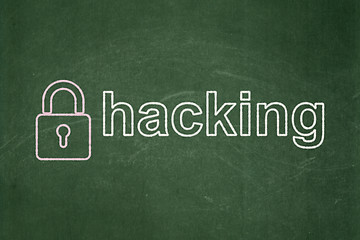 Image showing Safety concept: Closed Padlock and Hacking on chalkboard