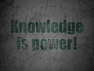 Image showing Education concept: Knowledge Is power! on grunge wall background