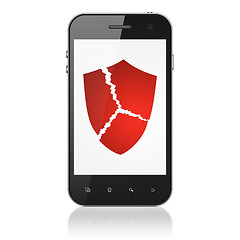 Image showing Security concept: Broken Shield on smartphone