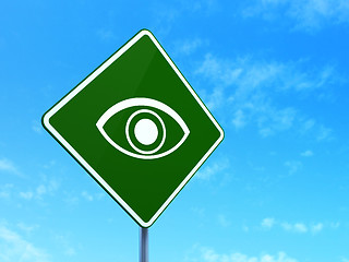 Image showing Security concept: Eye on road sign background