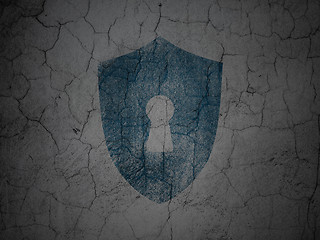Image showing Privacy concept: Shield With Keyhole on grunge wall background