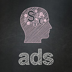 Image showing Marketing concept: Head With Finance Symbol and Ads