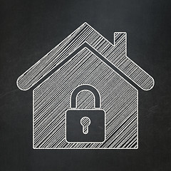 Image showing Protection concept: Home on chalkboard background