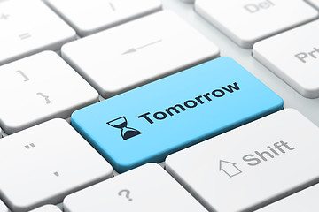 Image showing Timeline concept: Hourglass and Tomorrow on keyboard