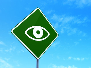 Image showing Security concept: Eye on road sign background