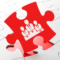 Image showing Advertising concept: Business Team on puzzle background