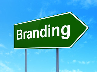 Image showing Advertising concept: Branding on road sign background