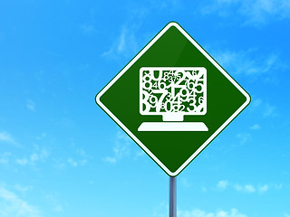 Image showing Education concept: Computer Pc on road sign background