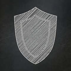 Image showing Privacy concept: Shield on chalkboard background