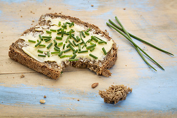 Image showing rye bread with butter and chive