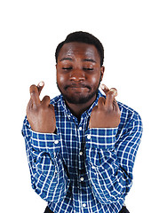 Image showing Black man crossing finger.