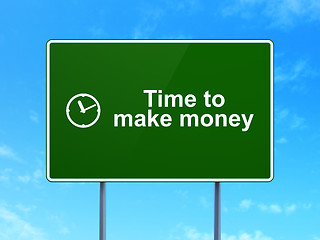 Image showing Time concept: Time to Make money and Clock on road sign