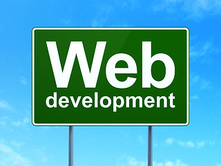 Image showing Web design concept: Web Development on road sign background