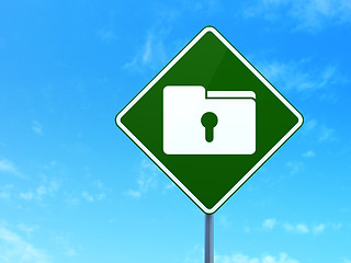 Image showing Business concept: Folder With Keyhole on road sign background