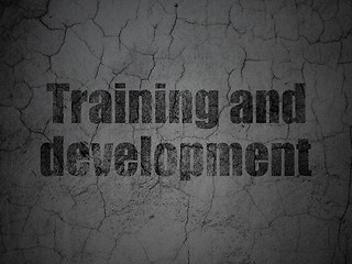 Image showing Education concept: Training and Development on grunge wall