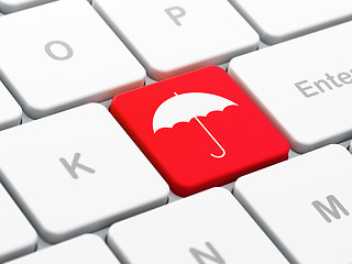 Image showing Privacy concept: Umbrella on computer keyboard background