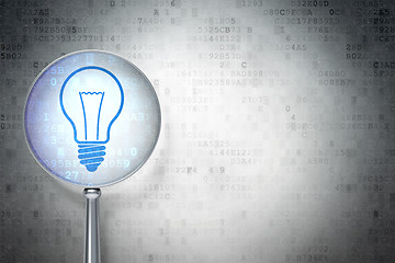 Image showing Business concept:  Light Bulb with optical glass on digital