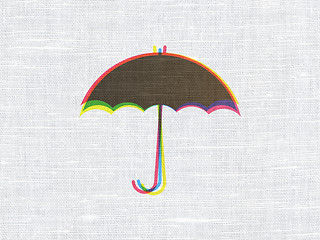 Image showing Protection concept: Umbrella on fabric texture background